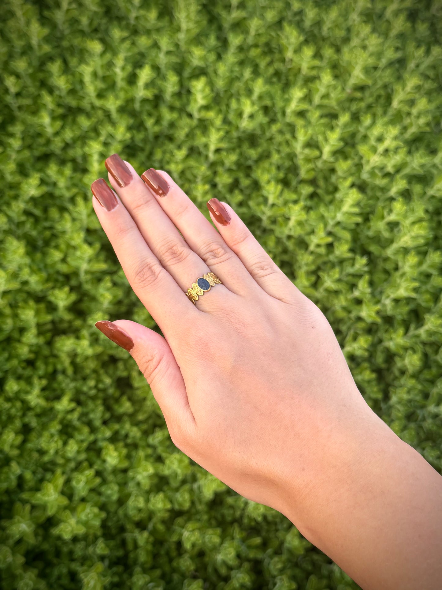 Gold Ring with Dark Gray Center