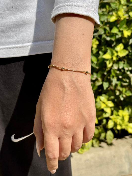 Delicate Gold‑Tone Bead Bracelet