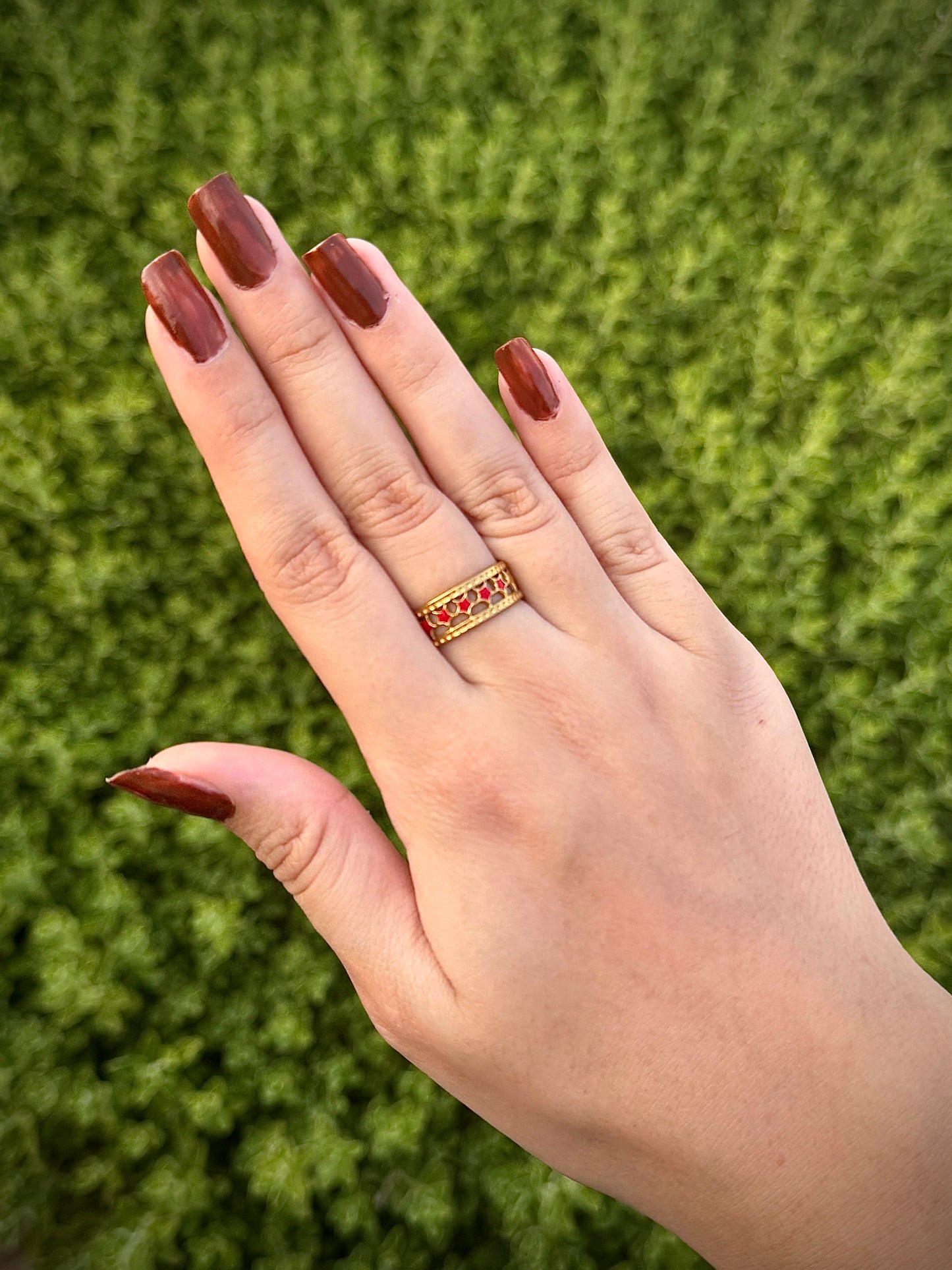 Gold Ring with Red Star Stones